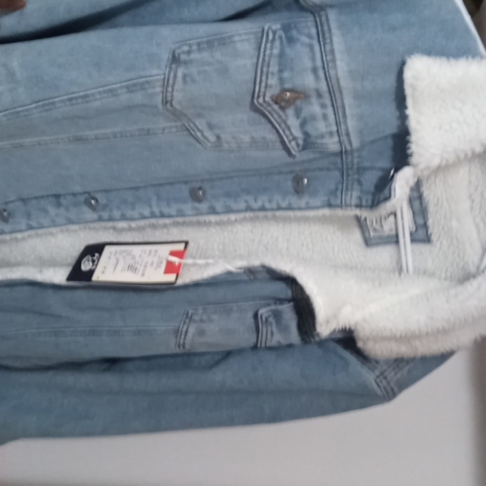 Winter fleece lined denim trucker jacket